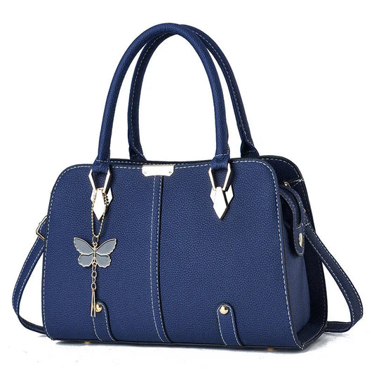 Modische Damen-Handtasche aus PU-Leder mit Schmetterlingsanhänger