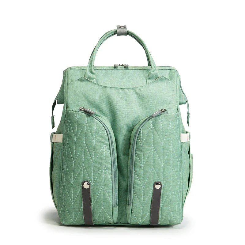 Tragbare Wickeltasche und Babybett