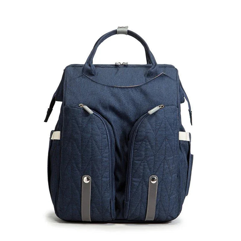 Tragbare Wickeltasche und Babybett