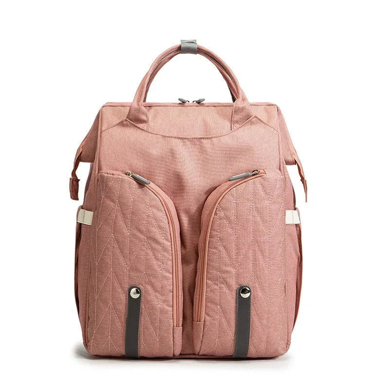 Tragbare Wickeltasche und Babybett