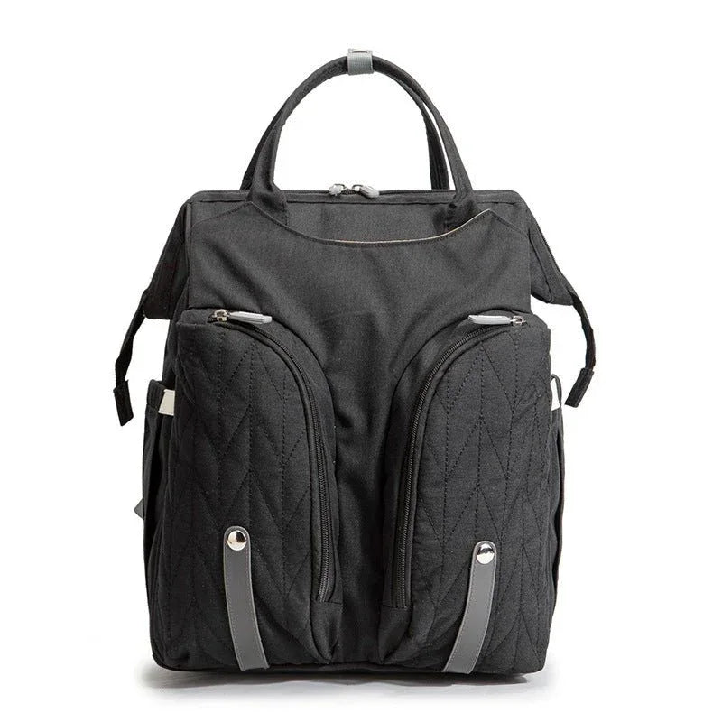 Tragbare Wickeltasche und Babybett