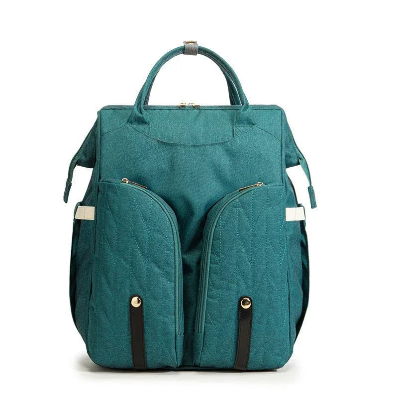 Tragbare Wickeltasche und Babybett