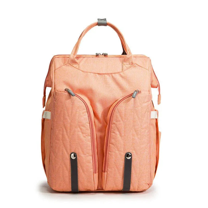 Tragbare Wickeltasche und Babybett