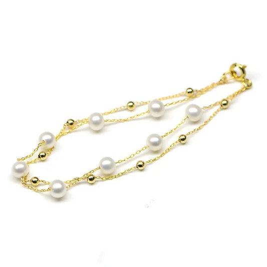Damenarmband mit 18 Karat Gold und zweireihigen Salzwasserperlen